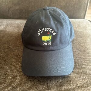 Masters Black Hat with Yellow and Red Logo